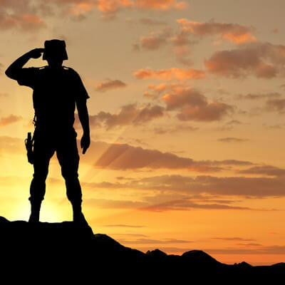 Silhouette of Soldier at Sunset
